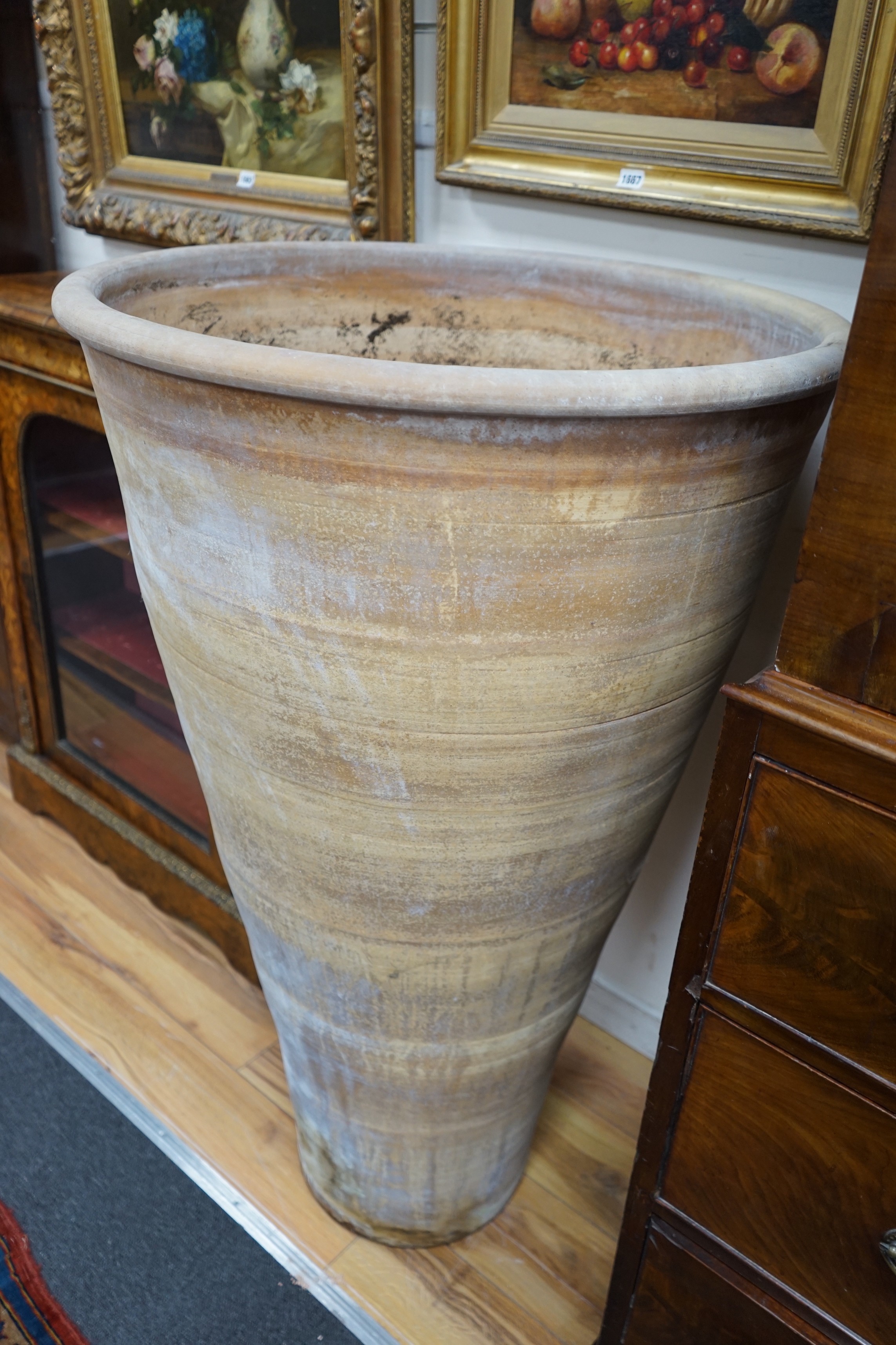 A pair of large terracotta garden urns of circular tapered form, diameter 75cm, height 118cm